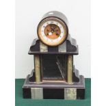 Victorian black and green marble clock with striking movement and mercury pendulum