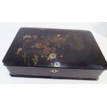 Japanese black lacquer trinket box, the lid decorated with chinoiserie scenes.