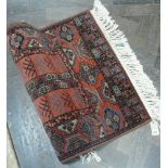 Small red & patterned modern Persian rug