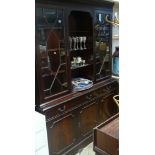 5' reproduction mahogany glazed bookcase unit with drawers and cupboards under