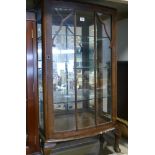 2' walnut bow front china cabinet