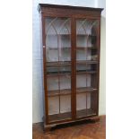 1920's Georgian style mahogany glazed 2 door bookcase with lattice doors and adjustable shelves,