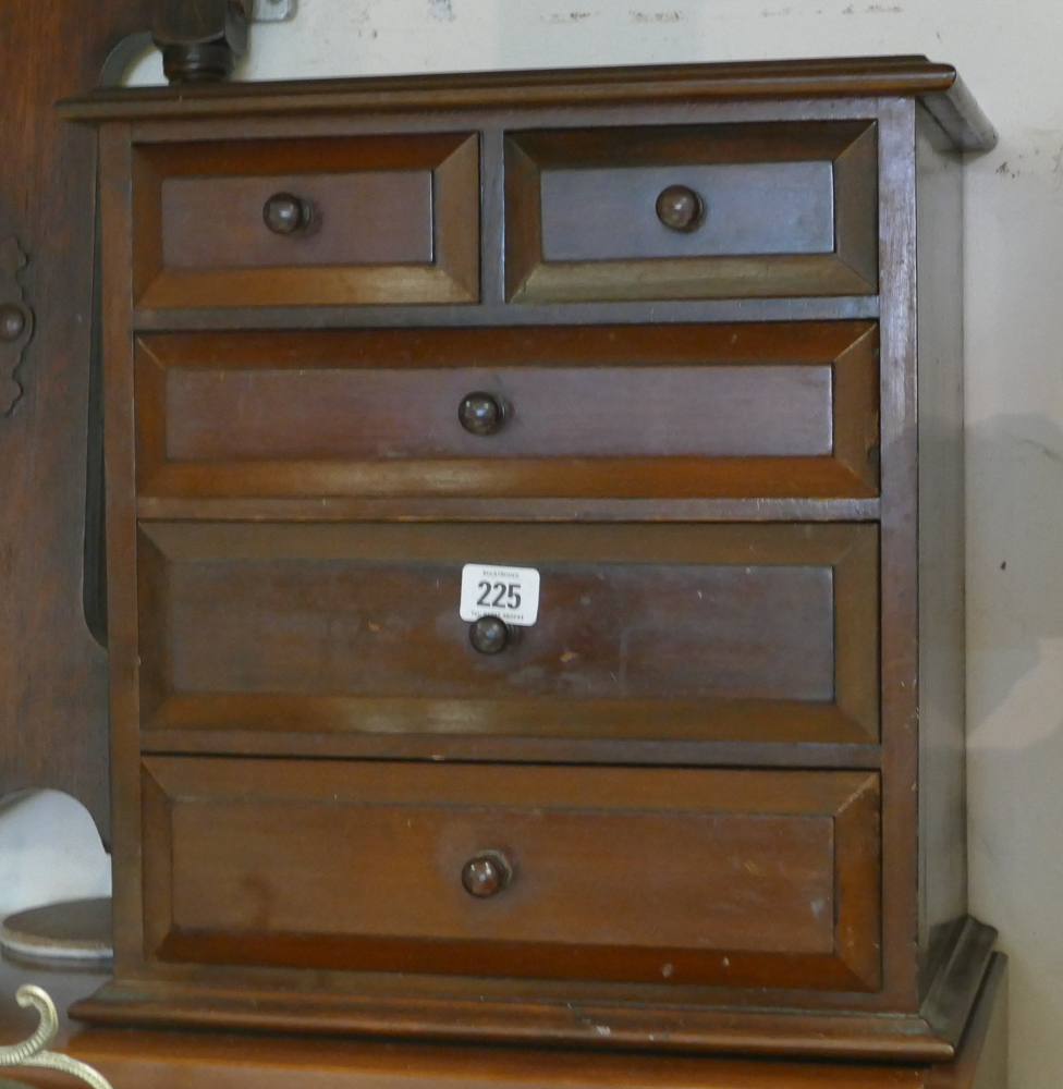 Miniature mahogany chest of 5 drawers