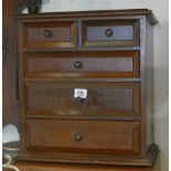 Miniature mahogany chest of 5 drawers