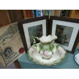 Floral decorated toilet jug and bowl and pair of framed prints