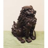 Chinese bronze temple lion ornament - measures approximately 11" high