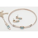 Modern silver and blue topaz set suite of jewellery comprising bangle,