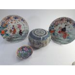 Oriental plates and a stoneware covered tobacco box bearing arms of the East India company