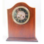 Striking bracket clock in mahogany case with black and brass dial