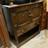 2'6 repro oak side cabinet with linen fold panels with drawer and under tier