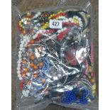 Assorted bag of costume jewellery and beads - ideal for crafters and jewellery makers.