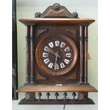 French striking wall clock with Roman numerals in oak case