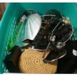 Green plastic tub full of costume jewellery