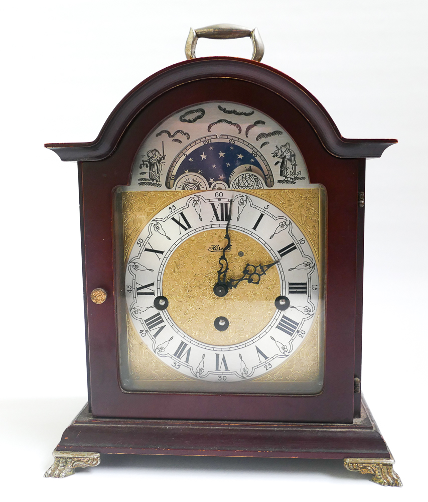 Reproduction Georgian style chiming bracket clock with brass and silvered dial and moon face in