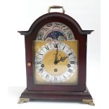 Reproduction Georgian style chiming bracket clock with brass and silvered dial and moon face in