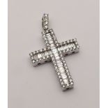 18ct white gold cross pendant set with baguette and brilliant cut diamonds with a diamond set