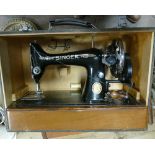 Singer hand operated sewing machine in case