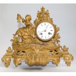 French striking mantel clock in gilt decorative case with figure mount