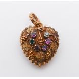 A Regency REGARD heart shaped locket pendant,