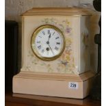 Mantle clock in floral decorated and pale pink china case,