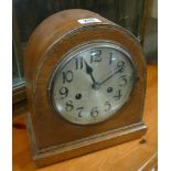 Oak cased arched case mantel clock