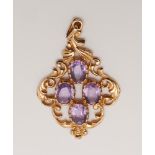 Victorian style amethyst set pendant in 9ct yellow gold scrolled mount,