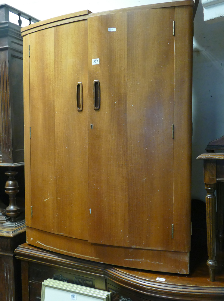 1970s 3' teak bow fronted cocktail cabinet with sliding glass doors and fold over top