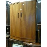 1970s 3' teak bow fronted cocktail cabinet with sliding glass doors and fold over top