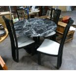 4' circular black and white polished granite topped single pillar dining table and four black high