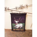Large White Hart painted pub sign with iron bracket