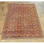 Brown and patterned Persian rug approx 5'3 x 4'