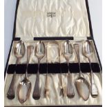 Set of six Georgian silver teaspoons and a pair of matching sugar nips in a later fitted box