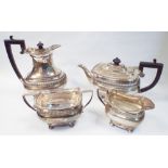 Antique style 4 piece silver tea service with ribbed border and shell cast edges Sheffield 1945.