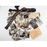 Small collection of German items of the Second World War to include cap tally, cloth Eagle,