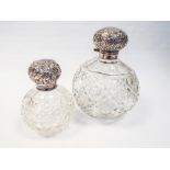 2 silver and cut glass dressing table jars of spherical form,