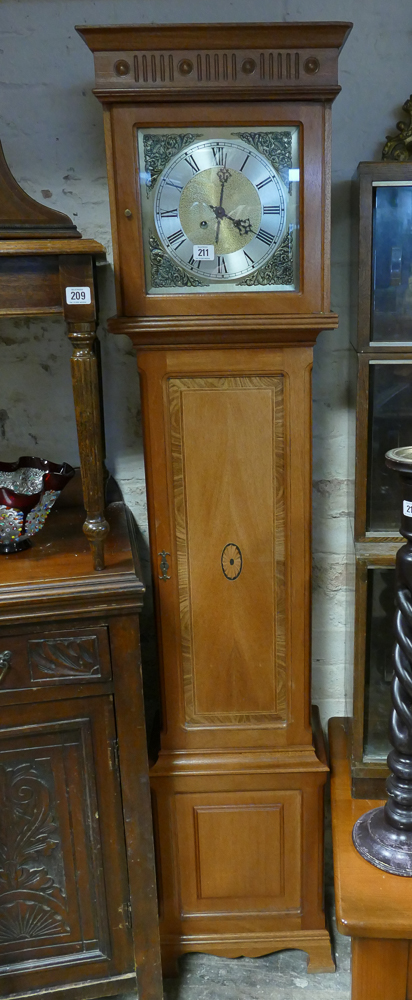 Reproduction striking grandfather clock in pale inlaid mahogany case with brass and silvered dial