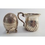 Edwardian silver christening tankard and a decorative egg shaped table pepper