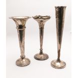 Three silver bud/specimen vases,