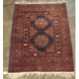 Red and patterned Persian rug approx 4' x 2'9