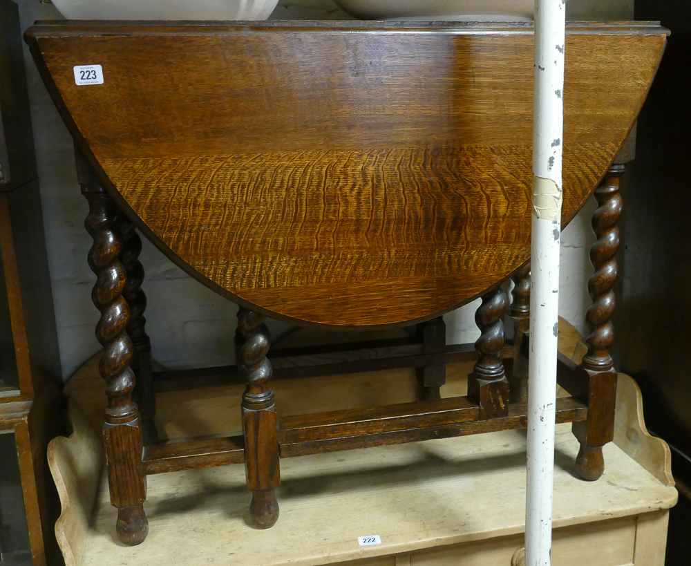 3' oval oak table on barley twist legs