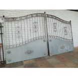 Pair of large good quality silver painted wrought iron double gates together with locks,