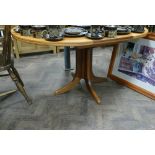 Circular Parker Knoll teak single pillar dining table with fold away centre leaf - approx 57" (with