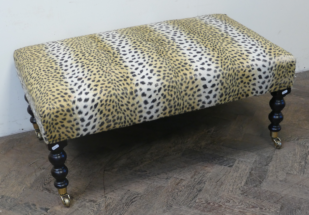 Very large stool with leopard print upholstery