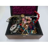 A Victorian mahogany box with assorted costume jewellery contents