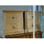 Pair of modern pine bedside chests with 2 drawers