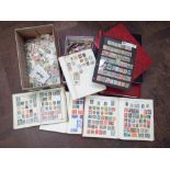 Large accumulation of British and world stamps contained within 2 shoe boxes,