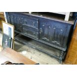 A 5' 1930's Jacobean style oak sideboard fitted centre drawers standing on barley twist legs with