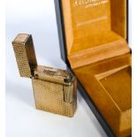 A Dupont gold plated cigarette lighter in case