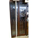 A 2'6 modern leaded glaze effect 2 door bookcase