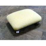 Yellow upholstered footstool